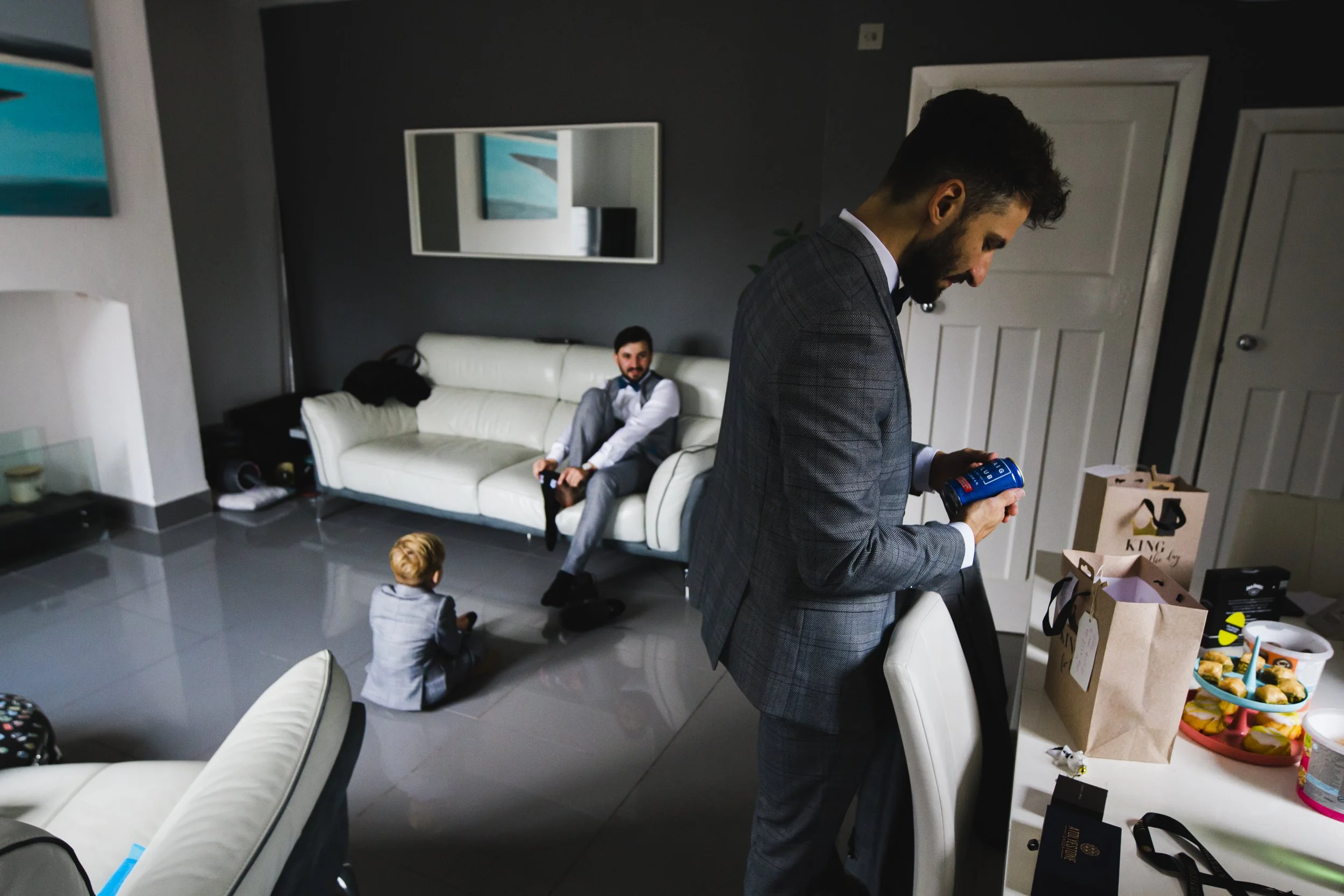 Final Touches: The Groom Tends to the Last Details as He Prepares Himself for the Most Important Day of His Life.