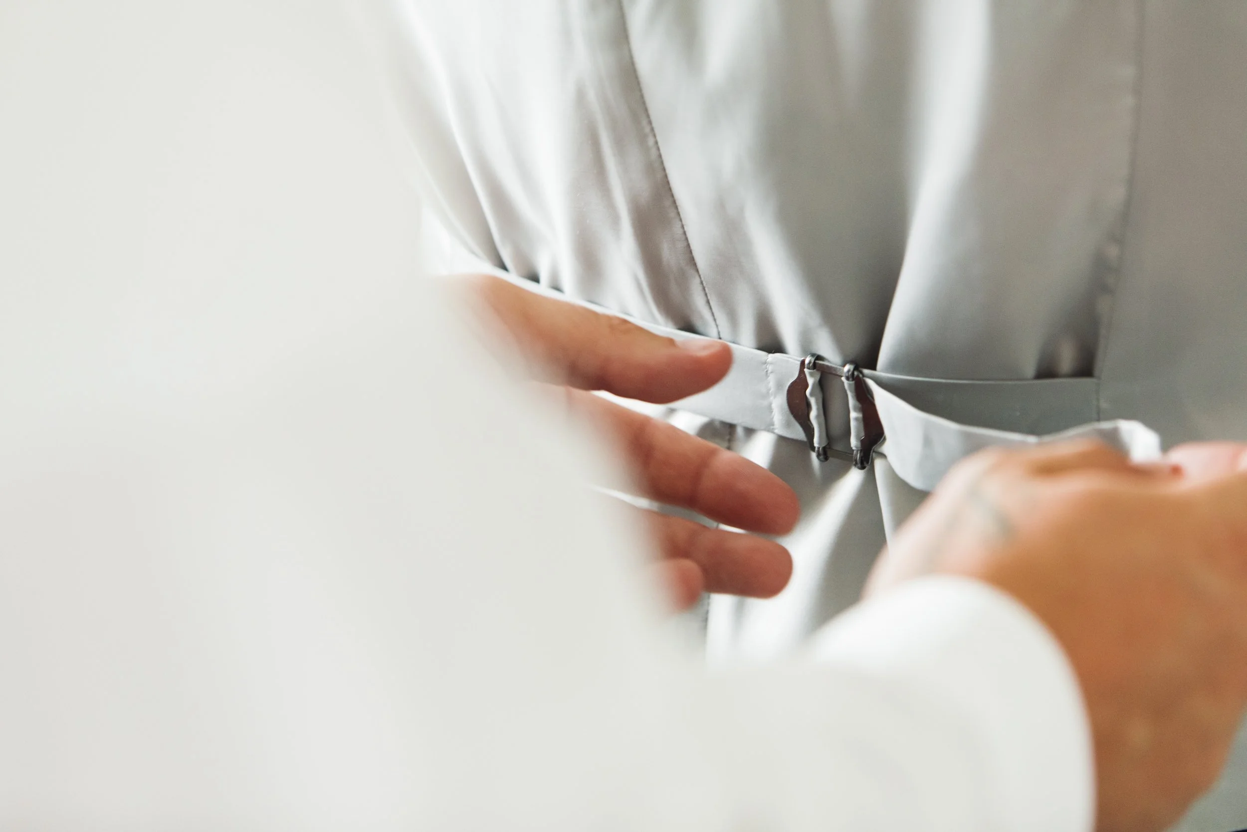 Groom Helping Best Man with Attire - Southport Wedding Day