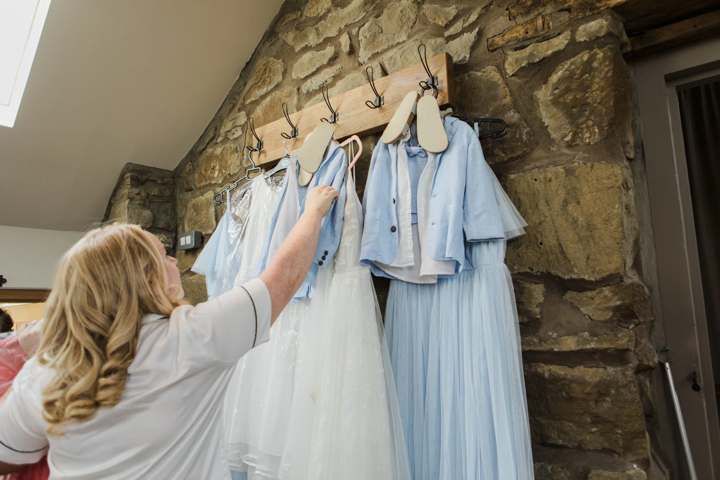 Bride Hangs Son’s Light Blue Outfit with Bridesmaids' Dresses - Tower Hill Barns: