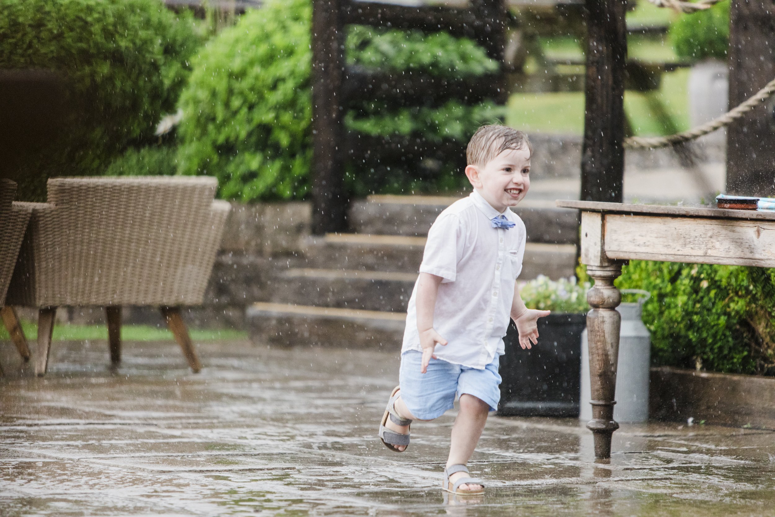 Child bravely navigates Thunderstorms at Tower Hill Barns Wedding
