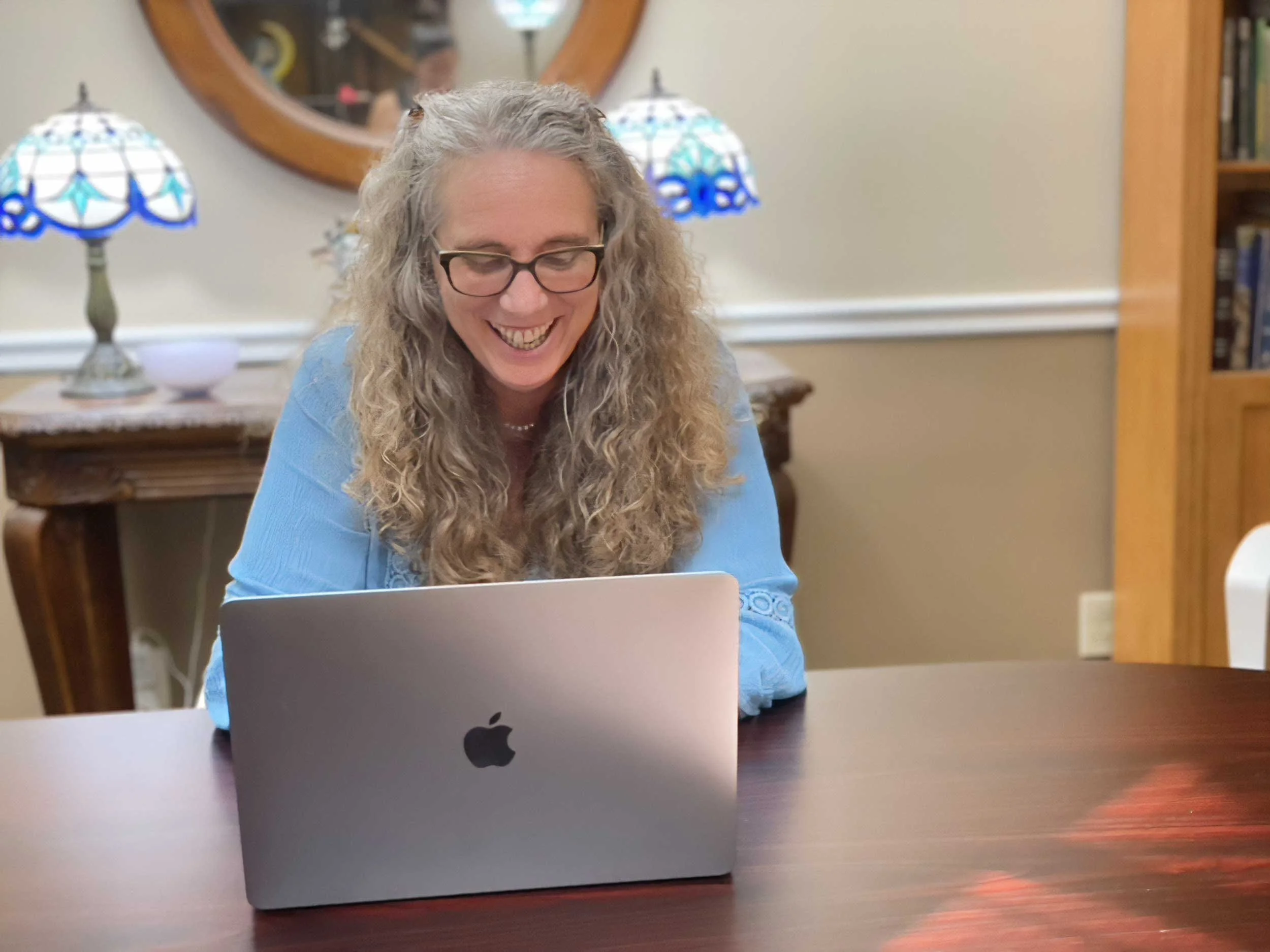 Christiana at her laptop, circa 2022
