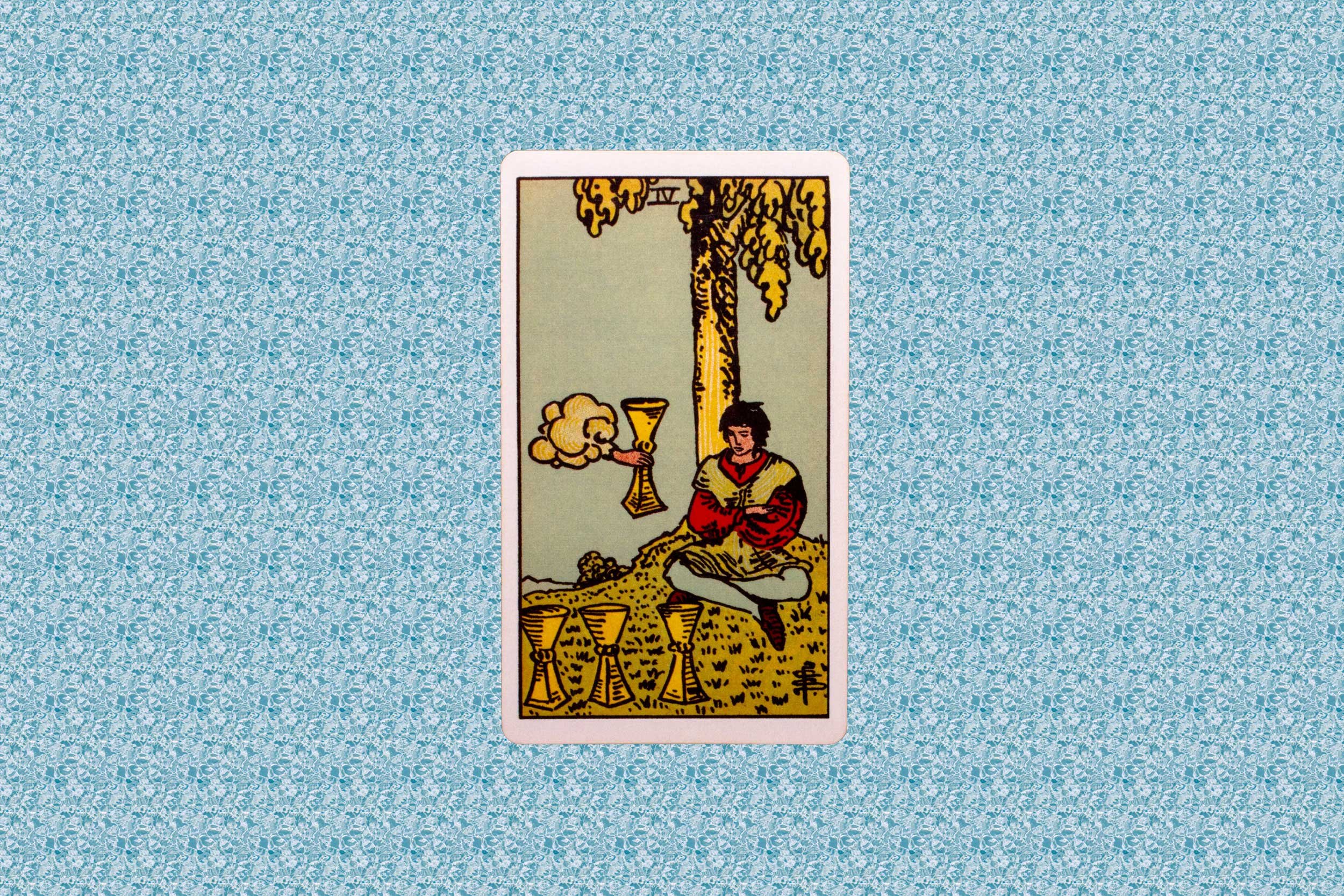 The Four of Cups tarot card.