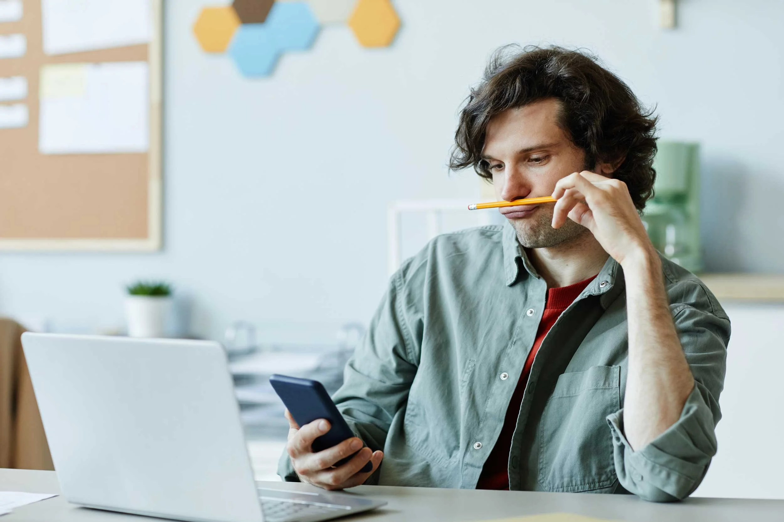 A man unfocused at work.