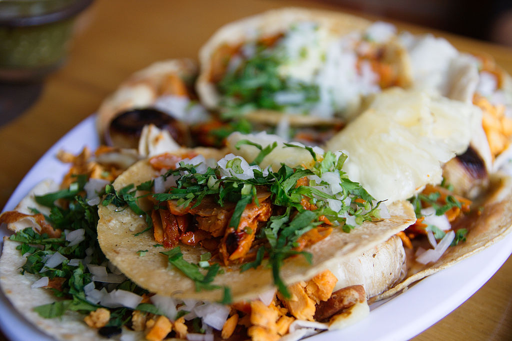 Photo: "01 Tacos al Pastor" by William Neuheisel - Flickr: Tacos al Pastor. Licensed under CC BY 2.0 via Wikimedia Commons.