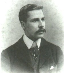 Photo of Waite in 1880, public domain, via Wikimedia Commons .