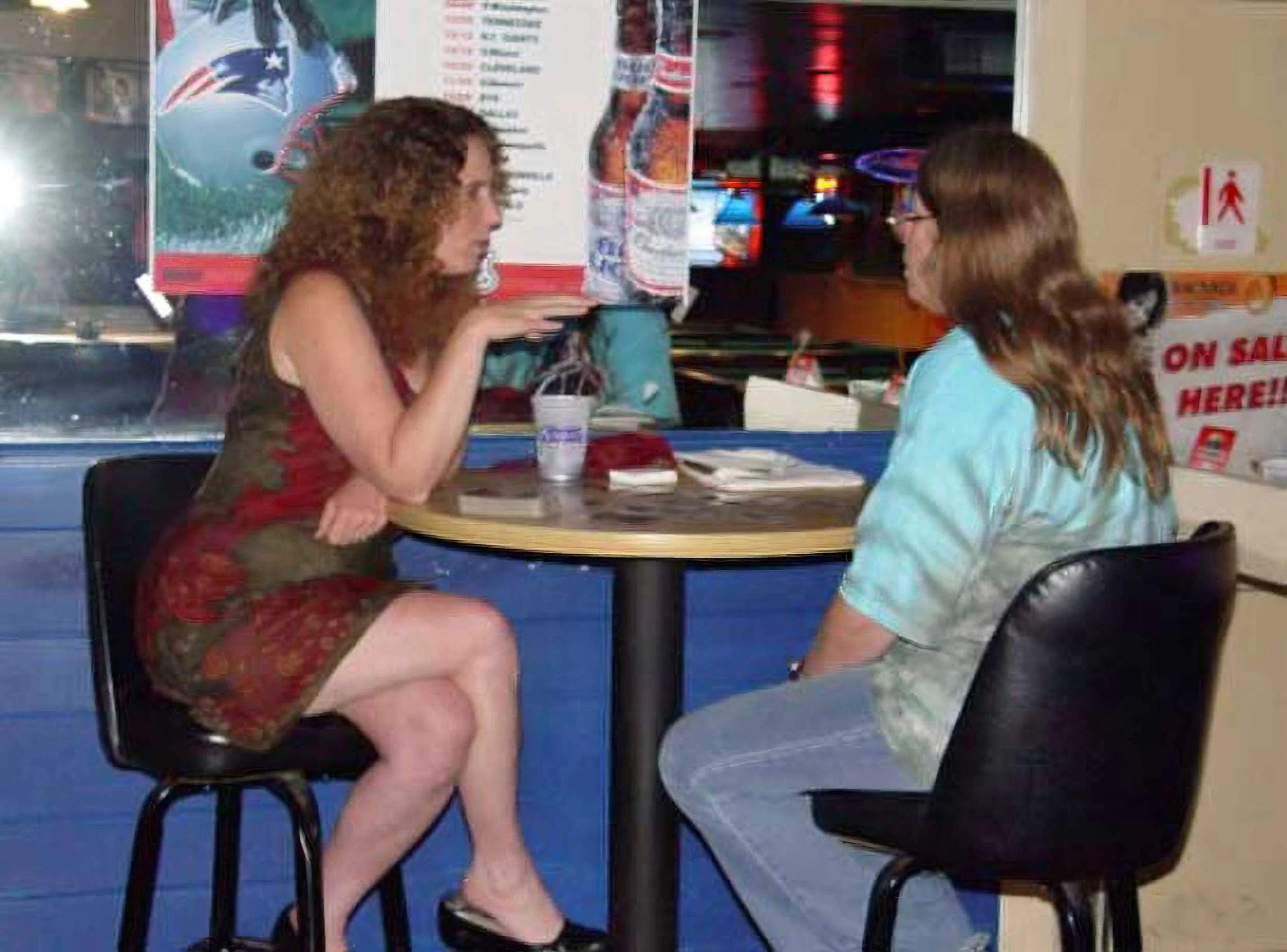 Christiana doing readings at a sports bar in Connecticut, circa 2003.