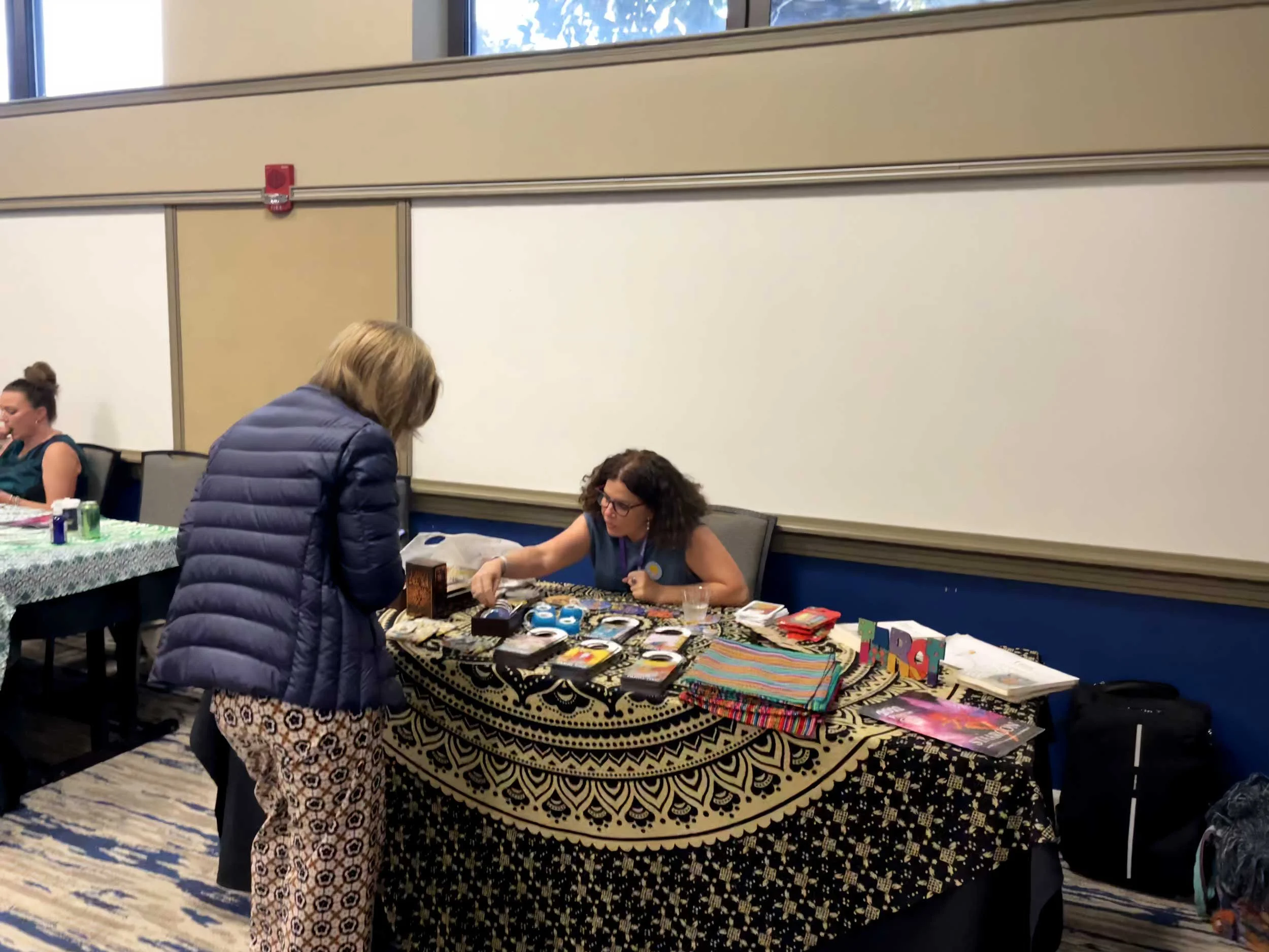Maria Luisa Salazar vending at StaarCon 2022