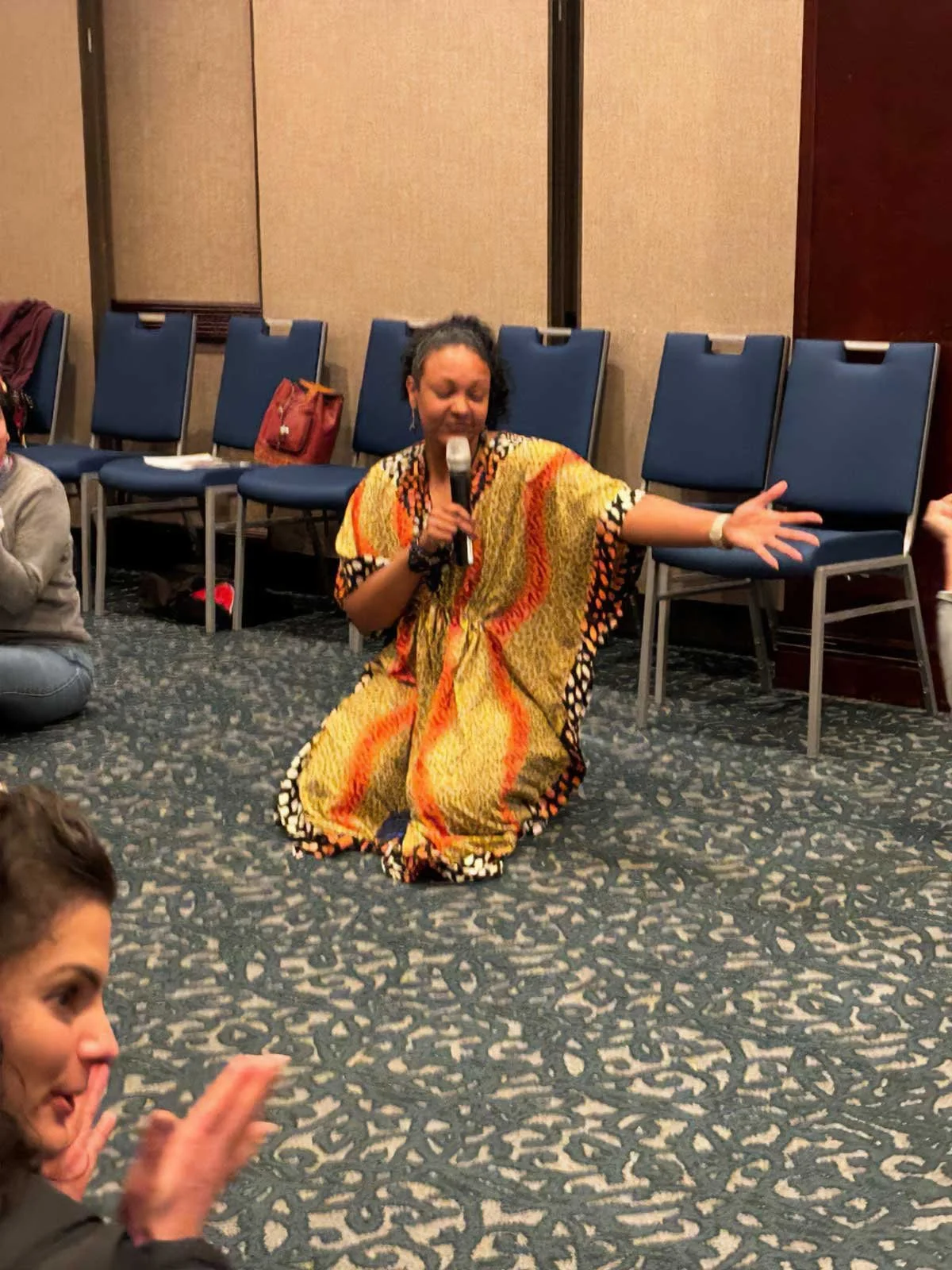 Mercedes Vasquez teaching energy work at StaarCon 2024.