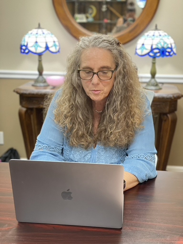 Christiana Gaudet working on a writing project.