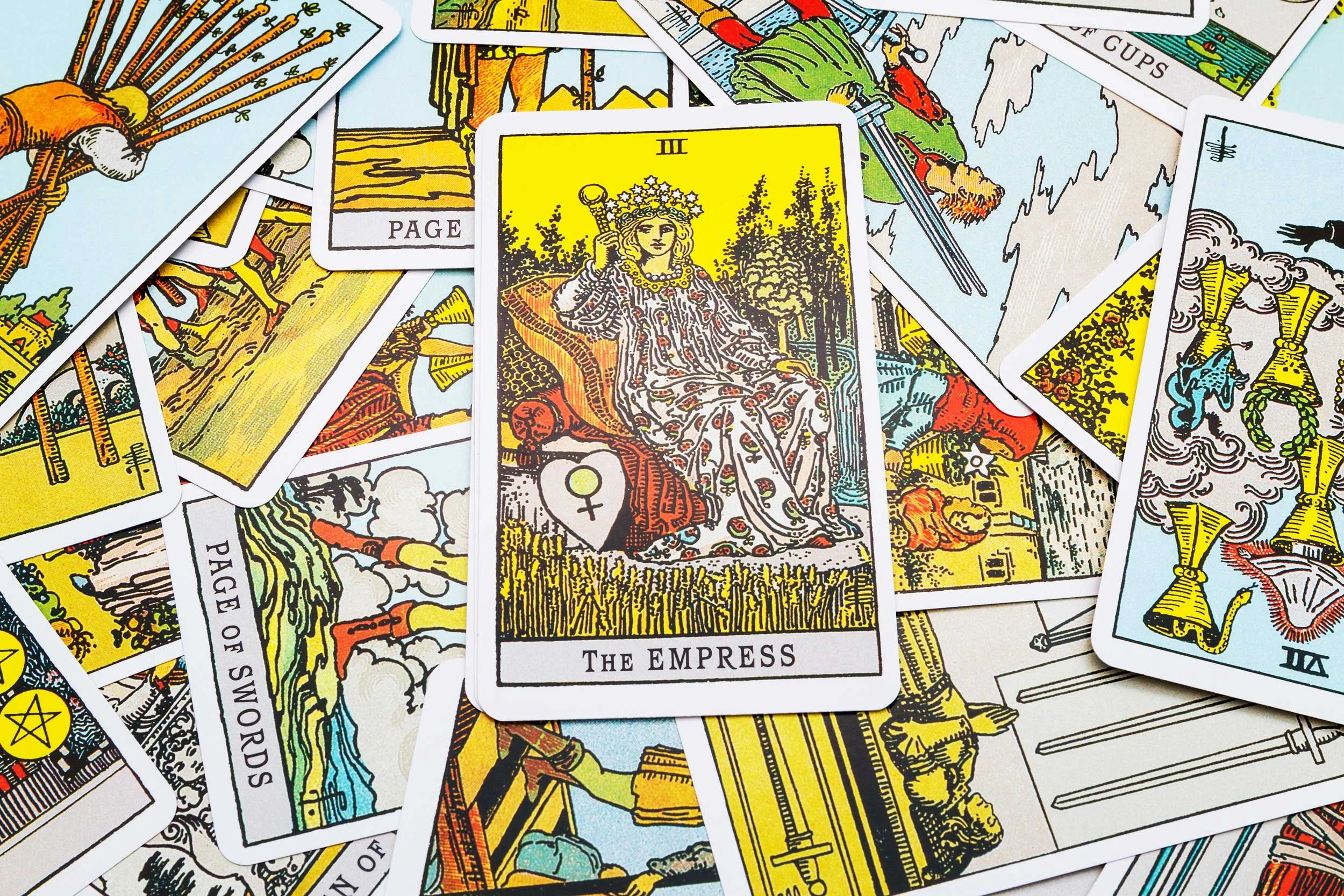 Tarot cards with a focus on the Empress.