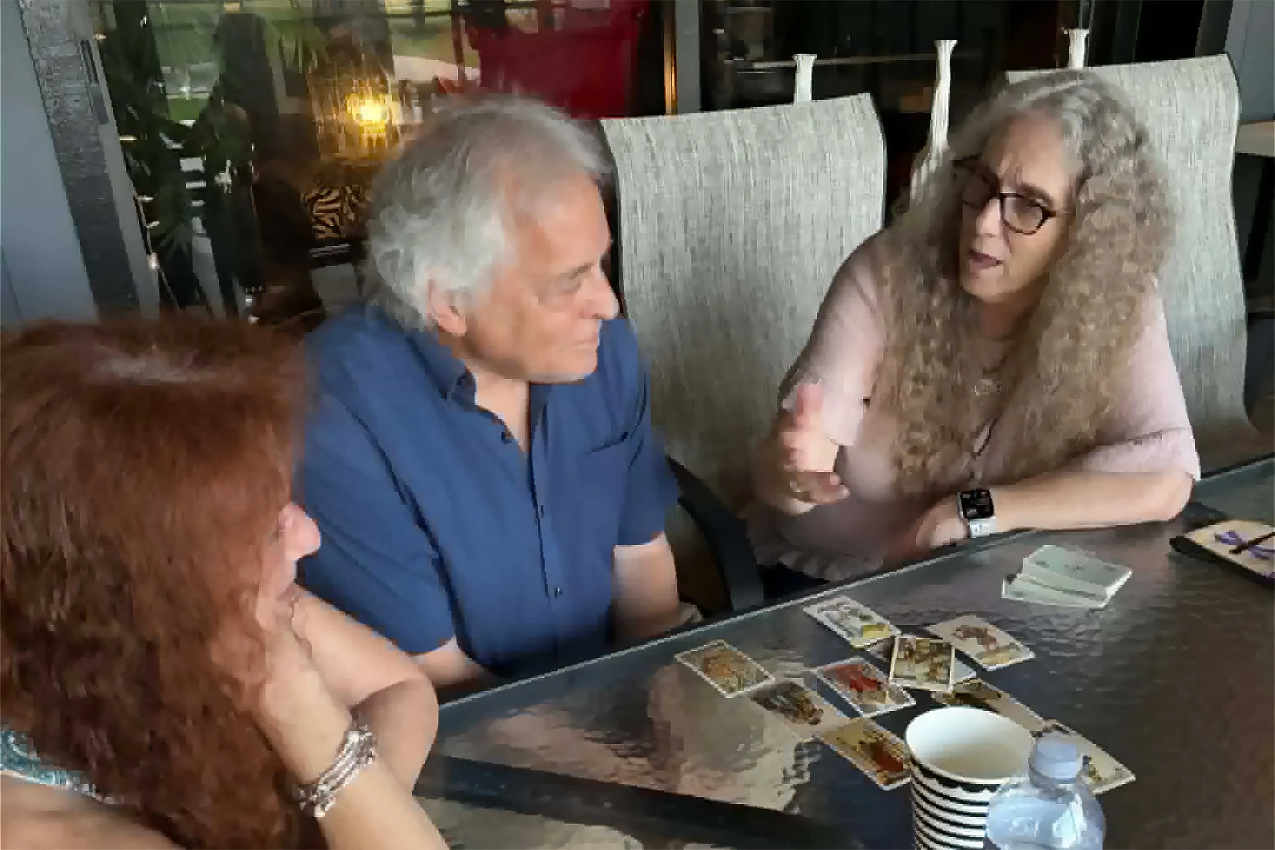 Christiana sharing a tarot technique at a recent tarot gathering in Palm City.