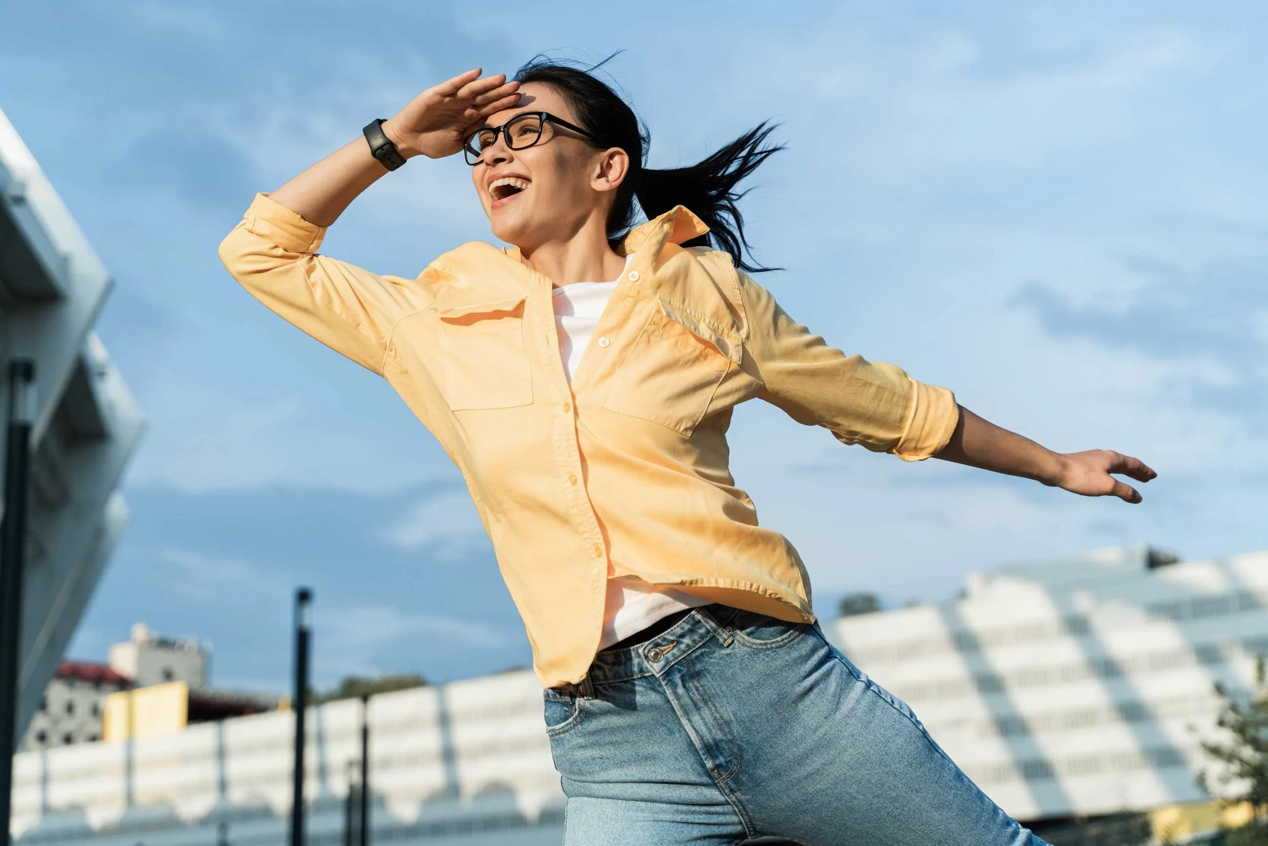 A young woman looks toward something new.