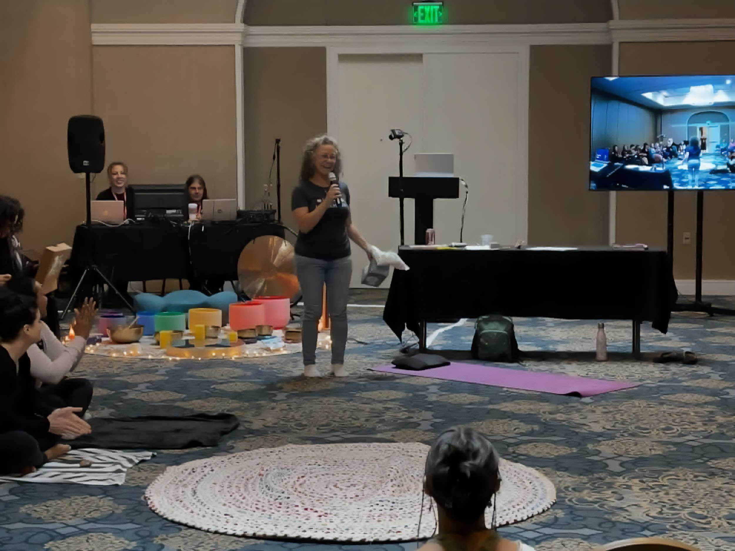 Michelle Barrie presenting a soundbath at StaarCon 2023.