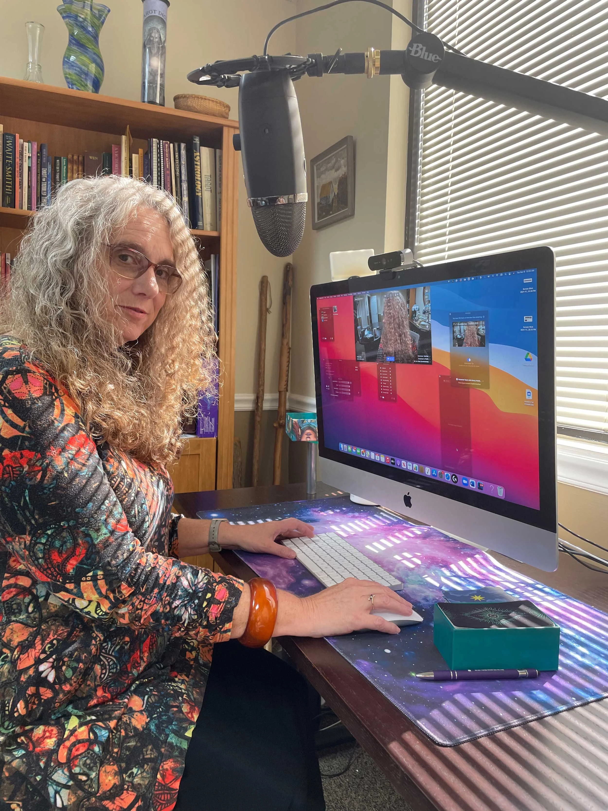 Christiana at her computer, 2021.