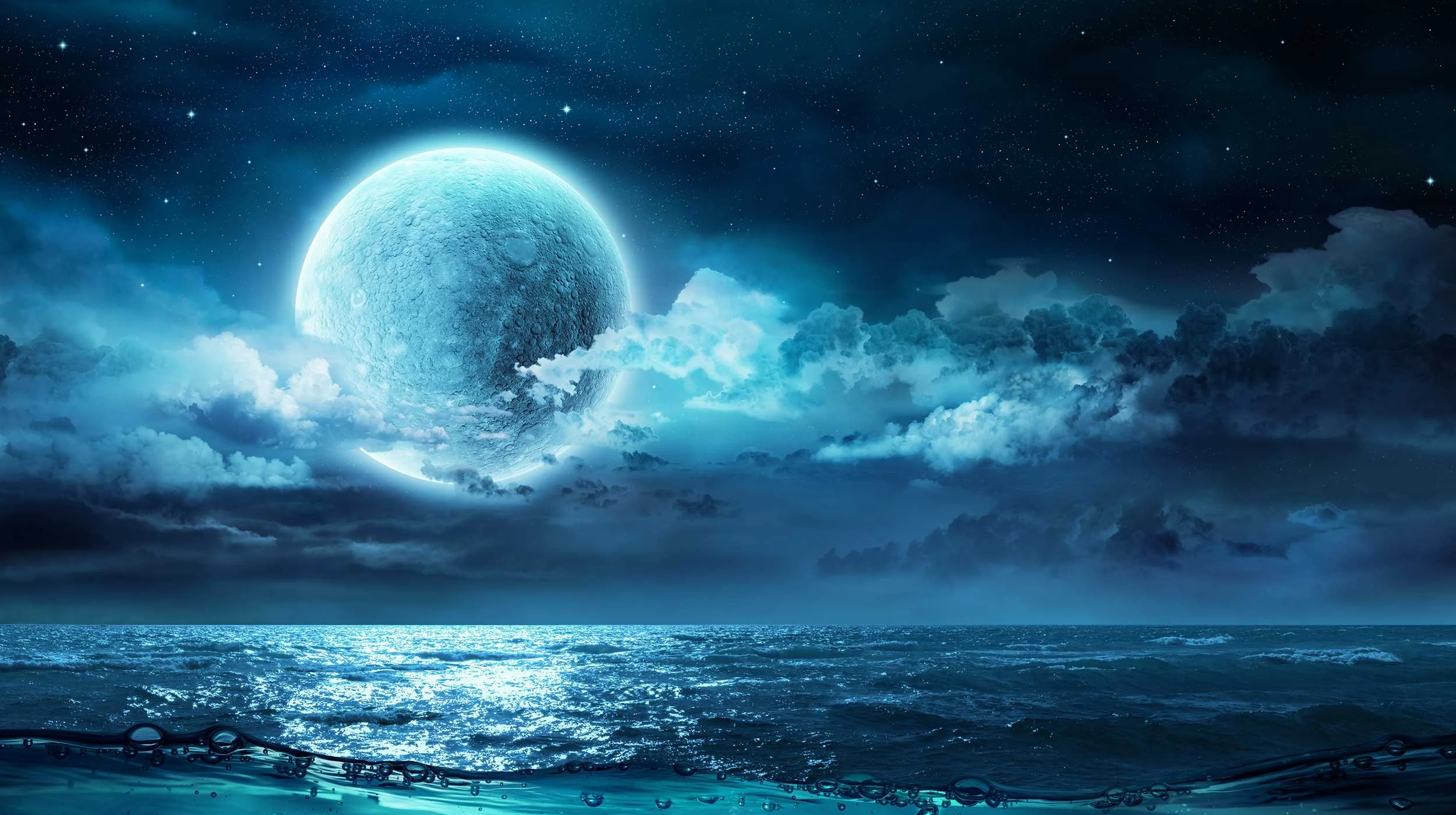 The full moon over the ocean
