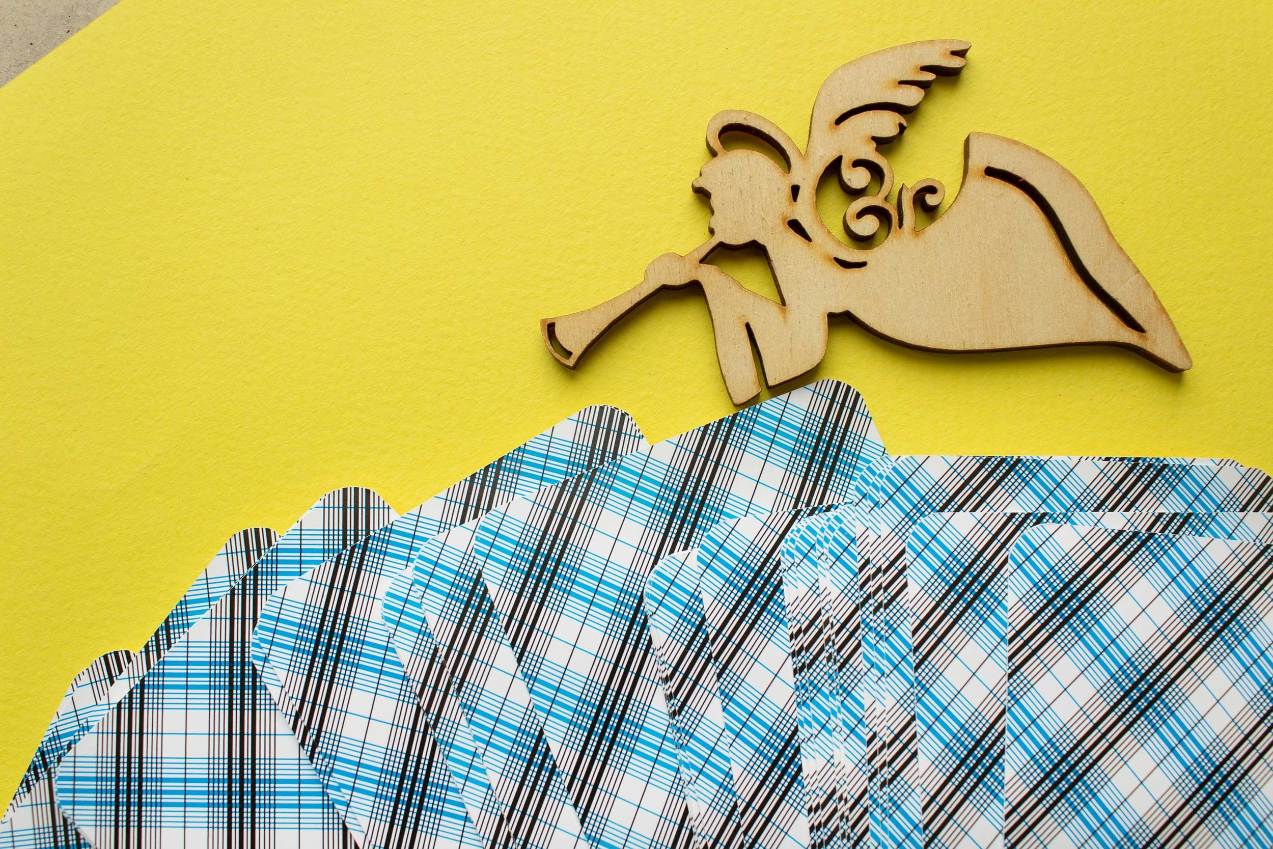 Tarot cards with an angel ornament.