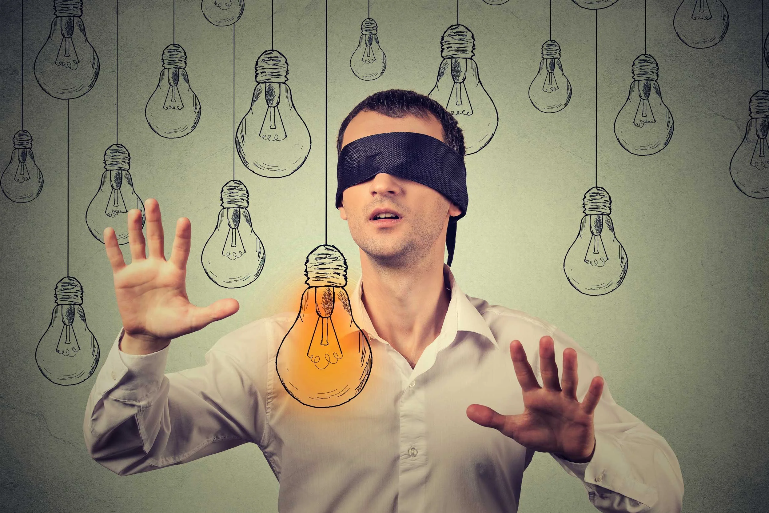 Concept illustration of a blindfolded man looking for his intuition.
