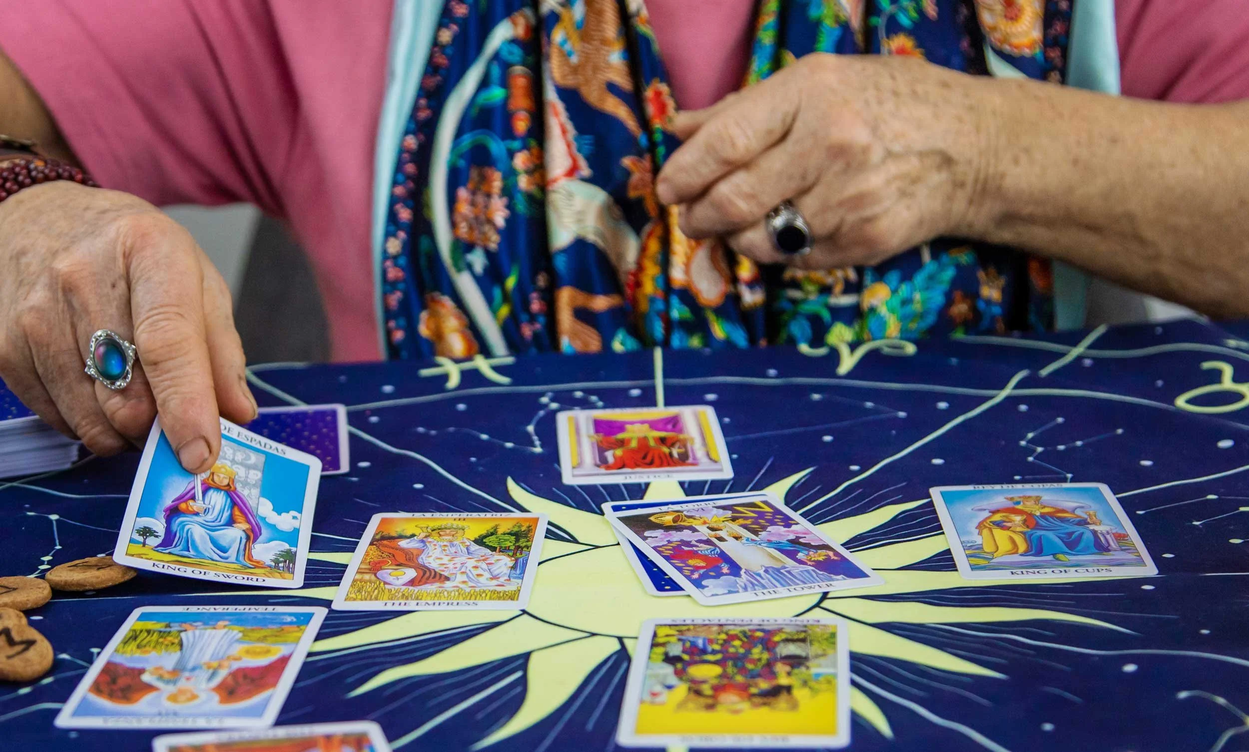 Close-up of a tarot reading in progress.