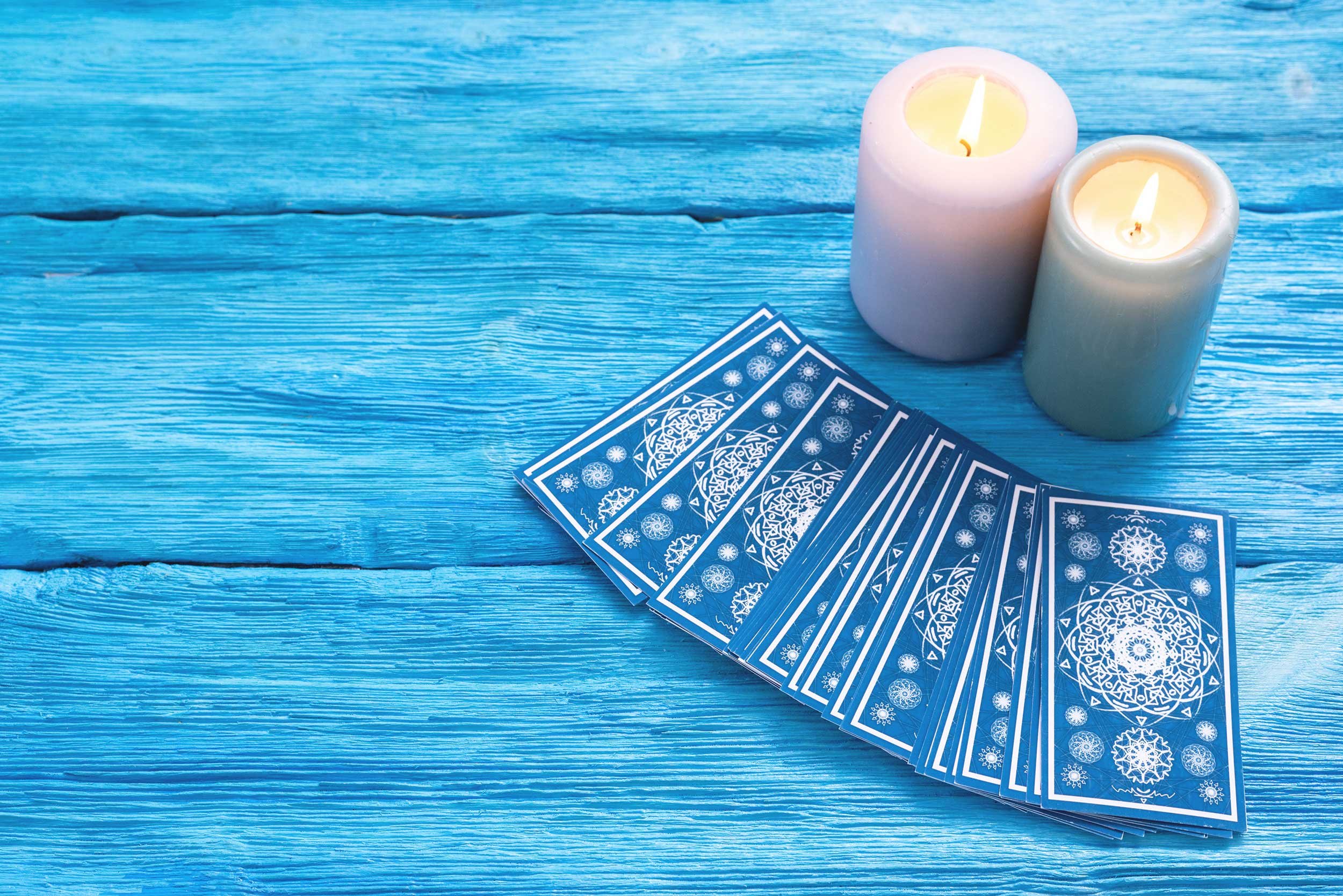 A tarot deck and candles.