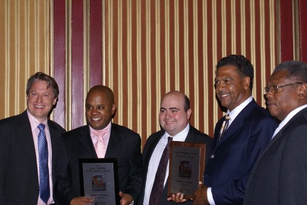 KLY Development receives the Chicago Association of Realtors 'Good Neighbor Award' and 'Bruce Abrams Award' in 2007 for its' New Homes for Englewood Development. (Pictured are Unknown, Kevin Rocio, Alex Chaparo, Karry Young & Mississippi Senator, Willie Simmons).