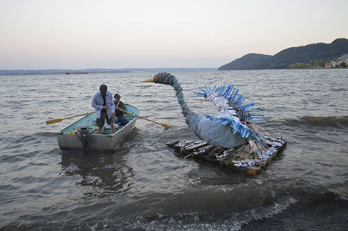 What else would you do with a "bird" sculpture but set her on a raft along the Hudson River.