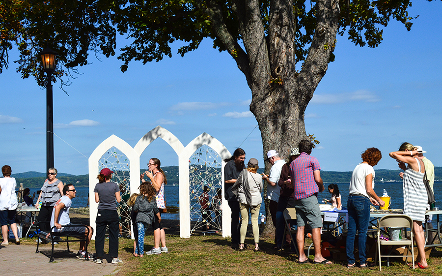 visitors gathering around a sculpture by Eileen Leith and Kerri Lee Green