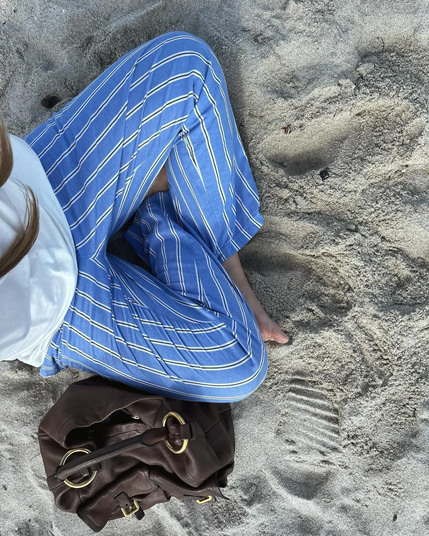 Sunburned &amp; covered in sand.