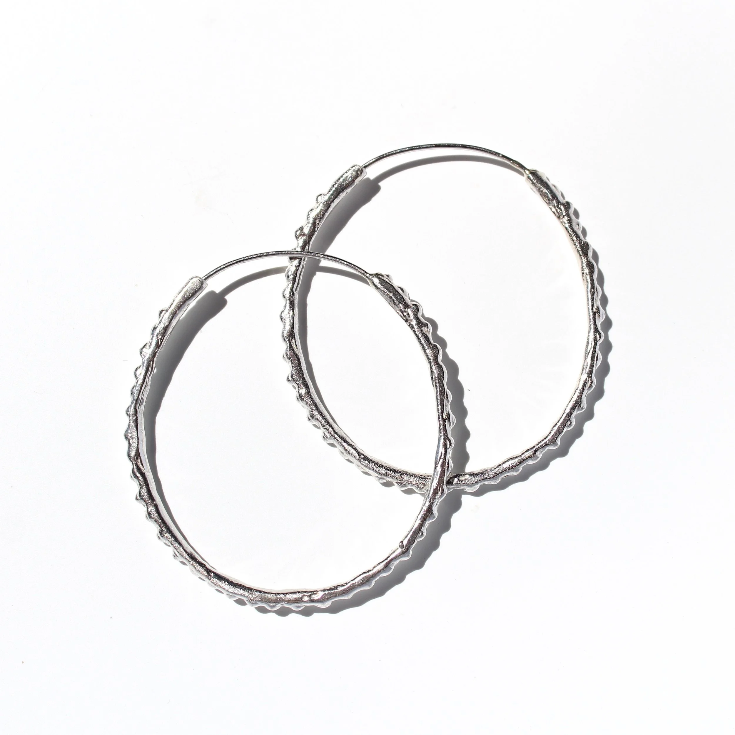 beaded hoops in silver