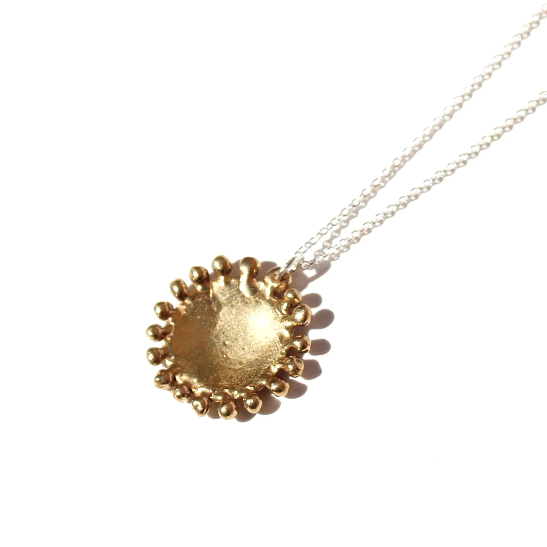 soleil necklace in brass