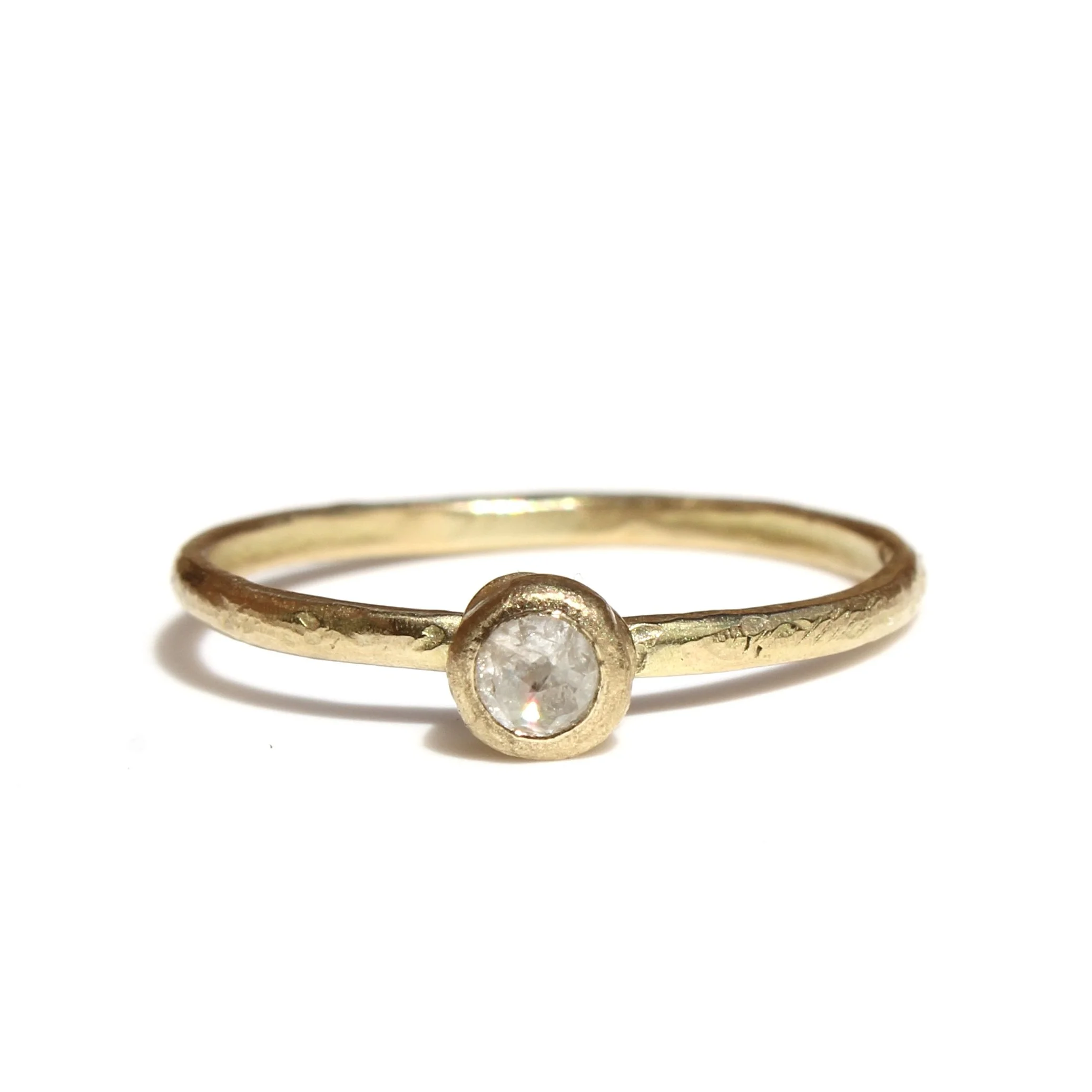 delicate rosecut diamond solitaire