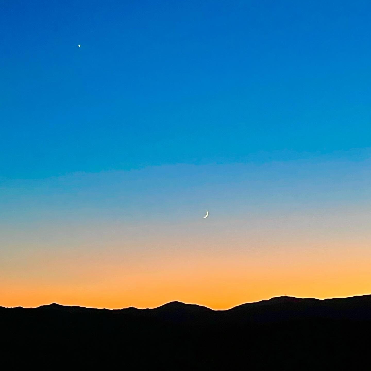 I almost didn&rsquo;t make it out to catch the moonset tonight because those autumn cozy vibes are kicking in hard, but I got rewarded for the rally with the tiniest sliver of a waxing crescent moon in Scorpio, Venus (in the top left) glittering like