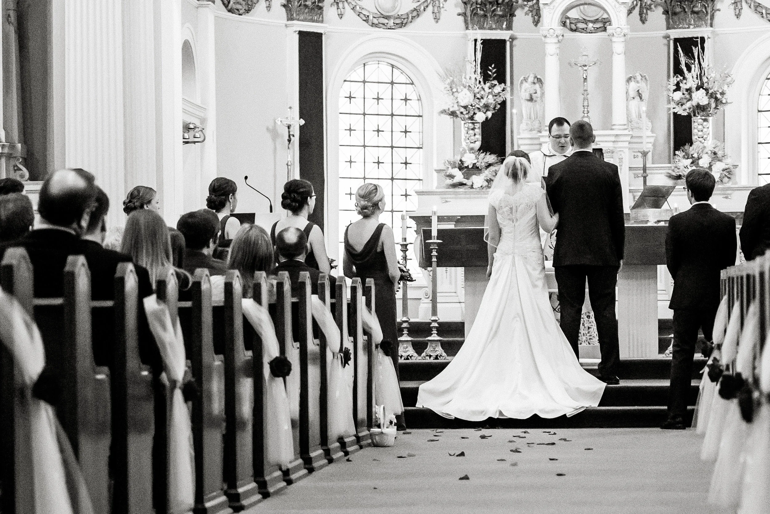 Bride and Groom during Ceremony at St. Peter's Catholic Church in Delano, MN