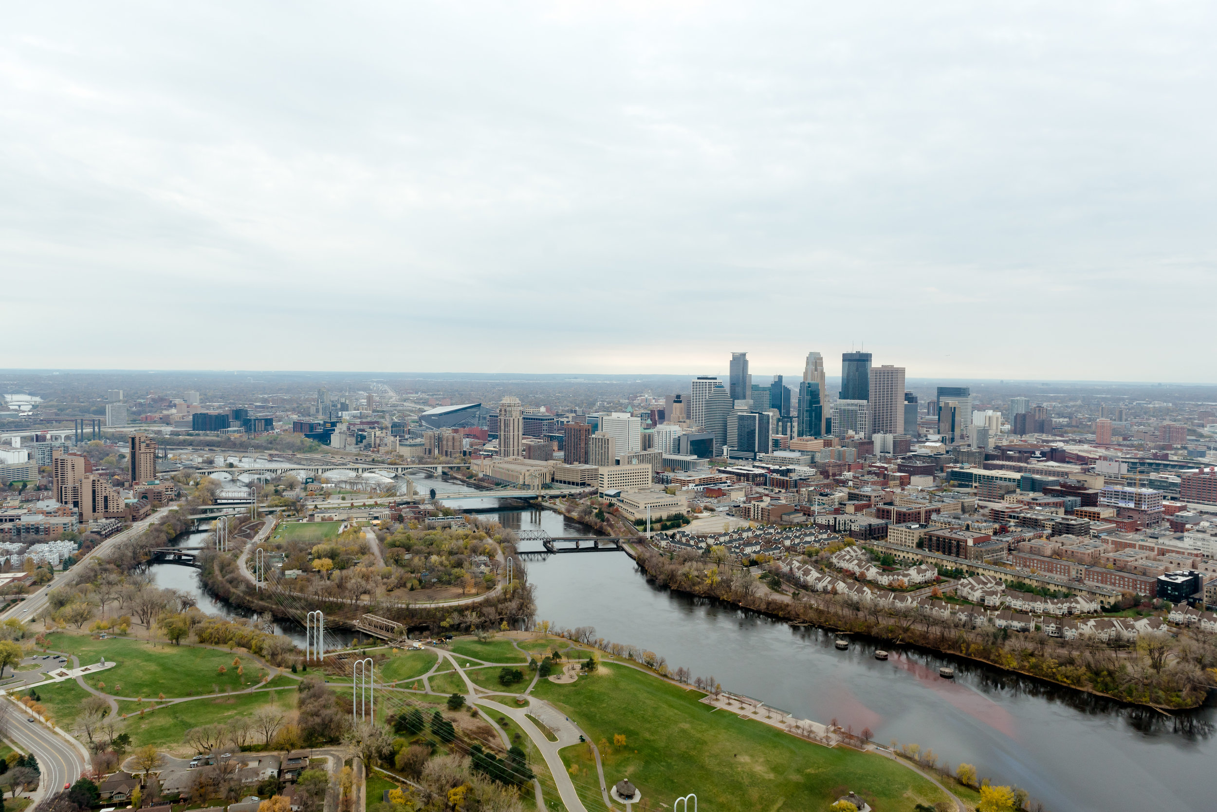 Aerial View of Minneapolis from Helicopter over Mississippi River - Minneapolis Wedding Photographer