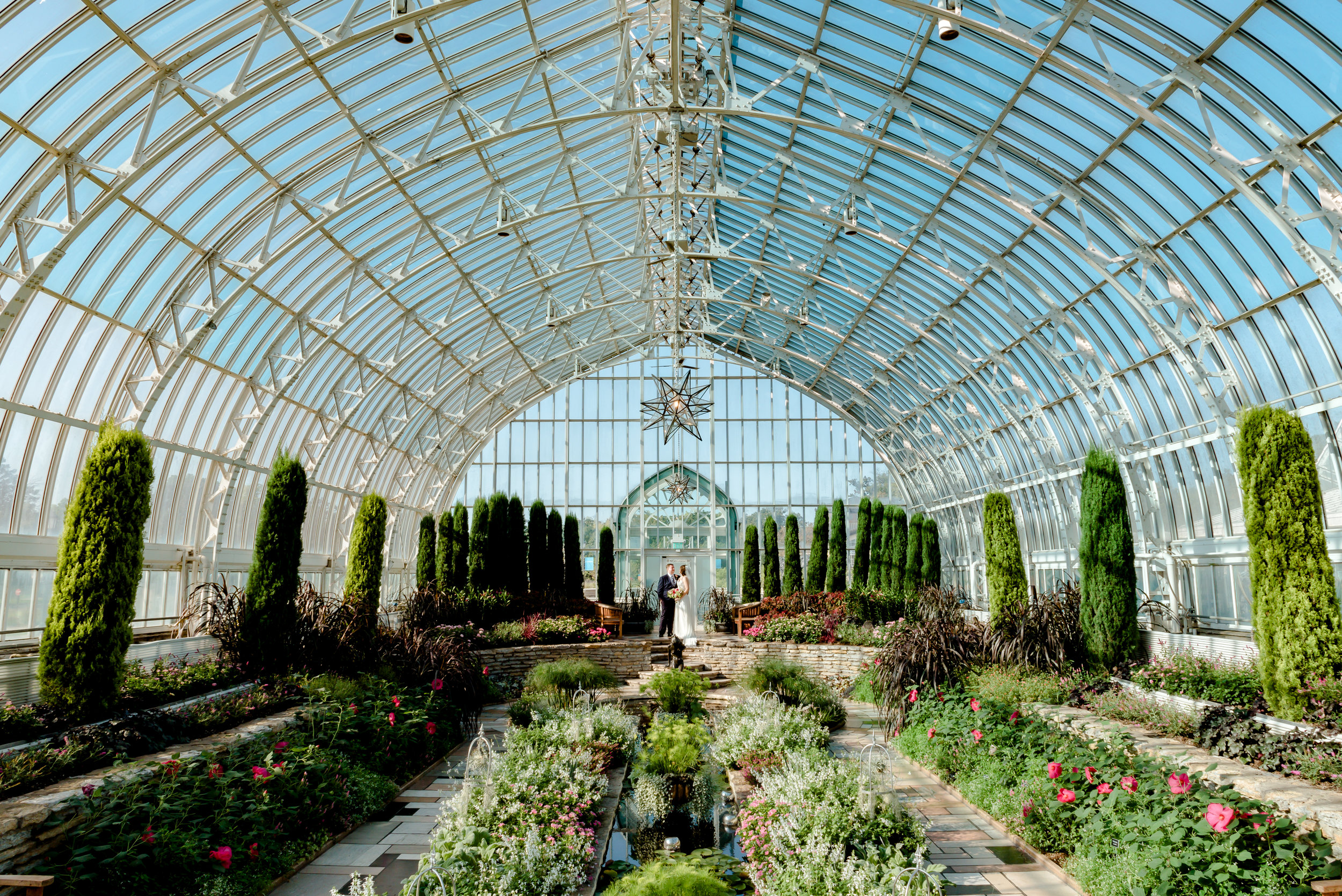 Best Wedding Photographer St. Paul - Como Conservatory Elopement Wedding - Bride and Groom in Sunken Garden after Wedding Ceremony