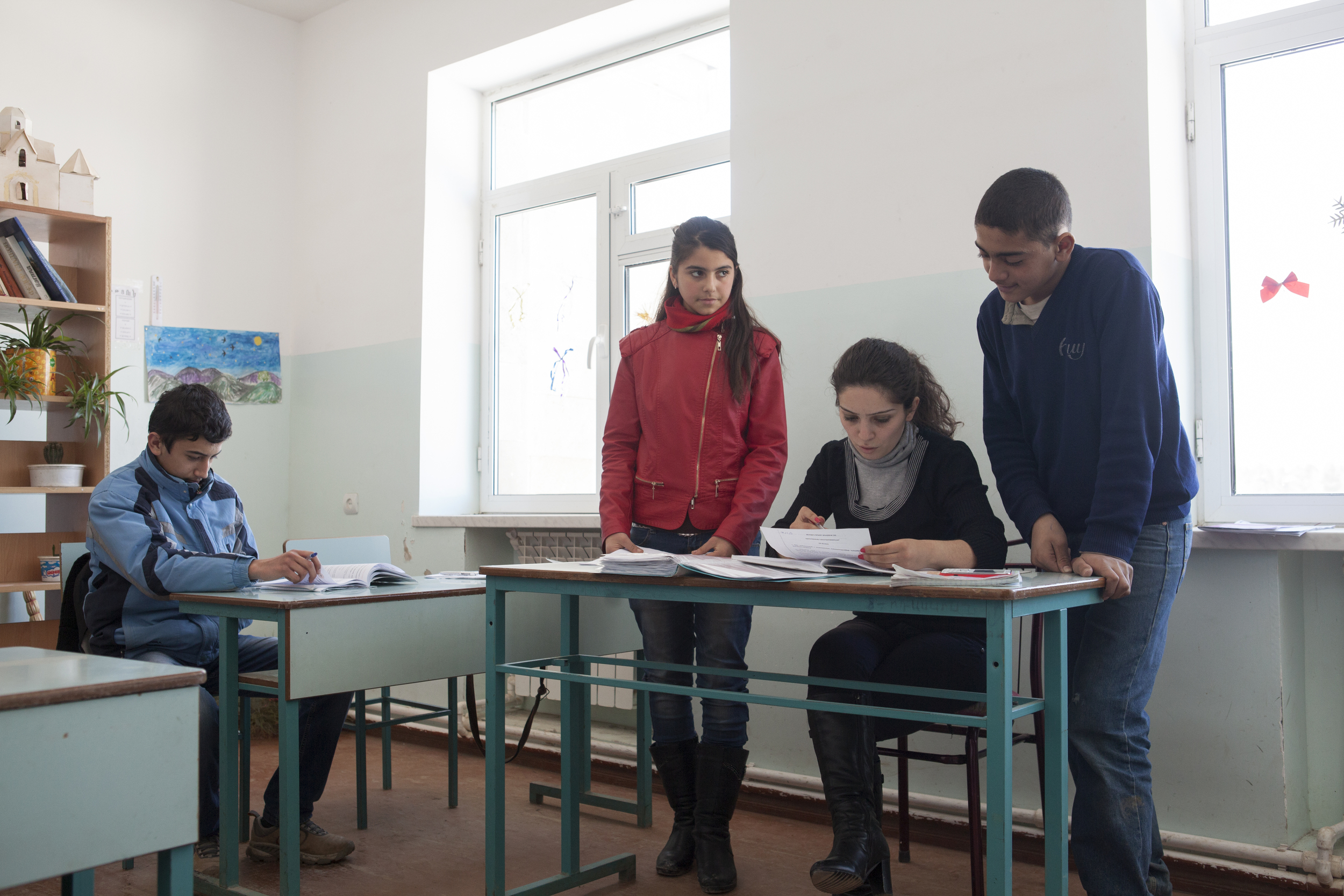  A Syrian-Armenian teenager (dressed in blue)&nbsp;among local classmates in the Kashatagh region of Nagorno-Karabakh.&nbsp; 