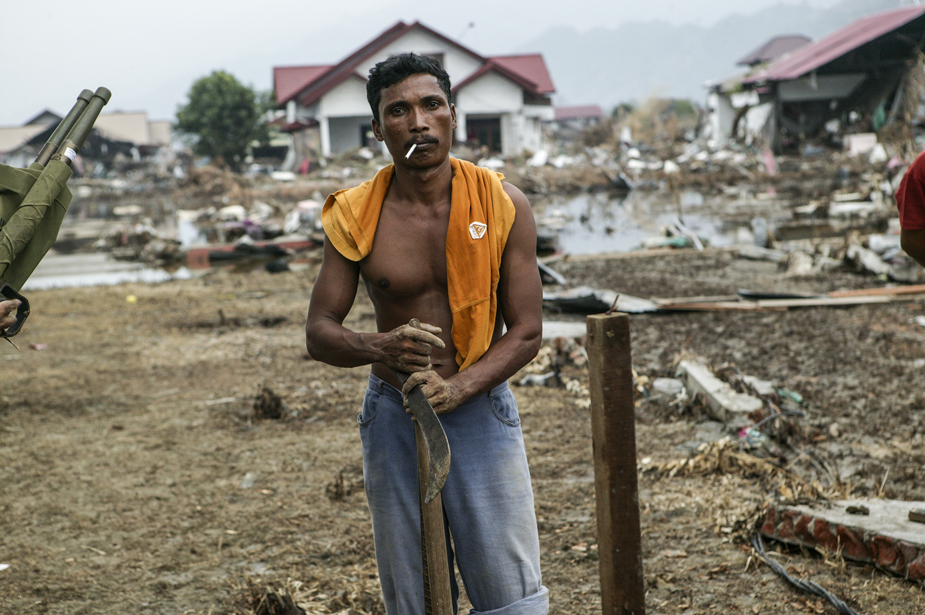  A man after burying a woman and a baby. 