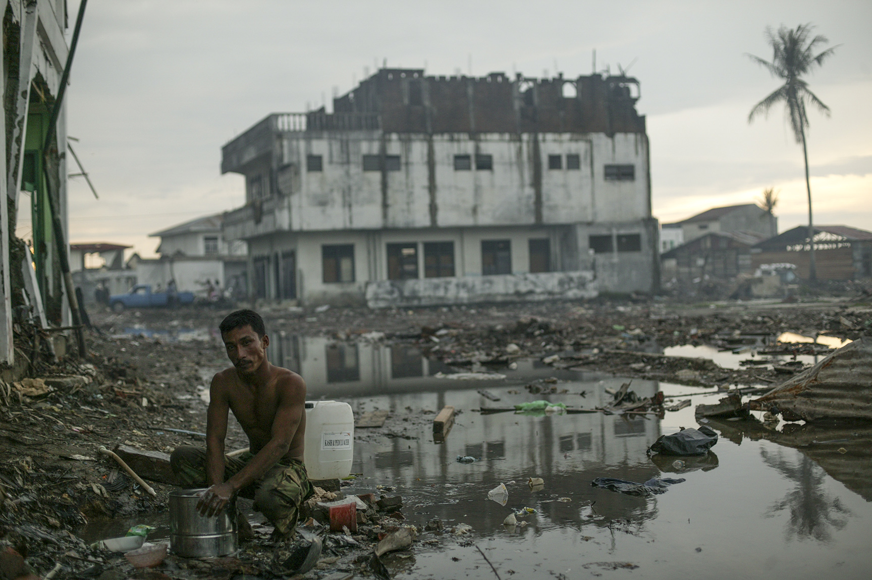  Three months later the city still remained&nbsp;in ruins. 