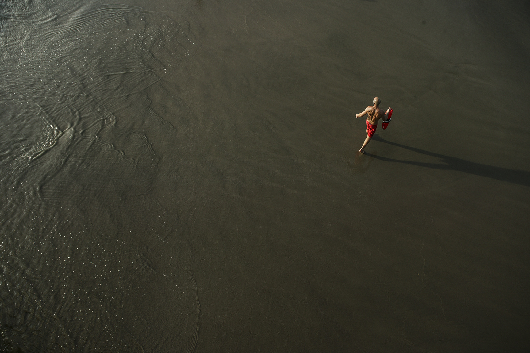 A lifeguard patrols the beaches of Santa Monica.