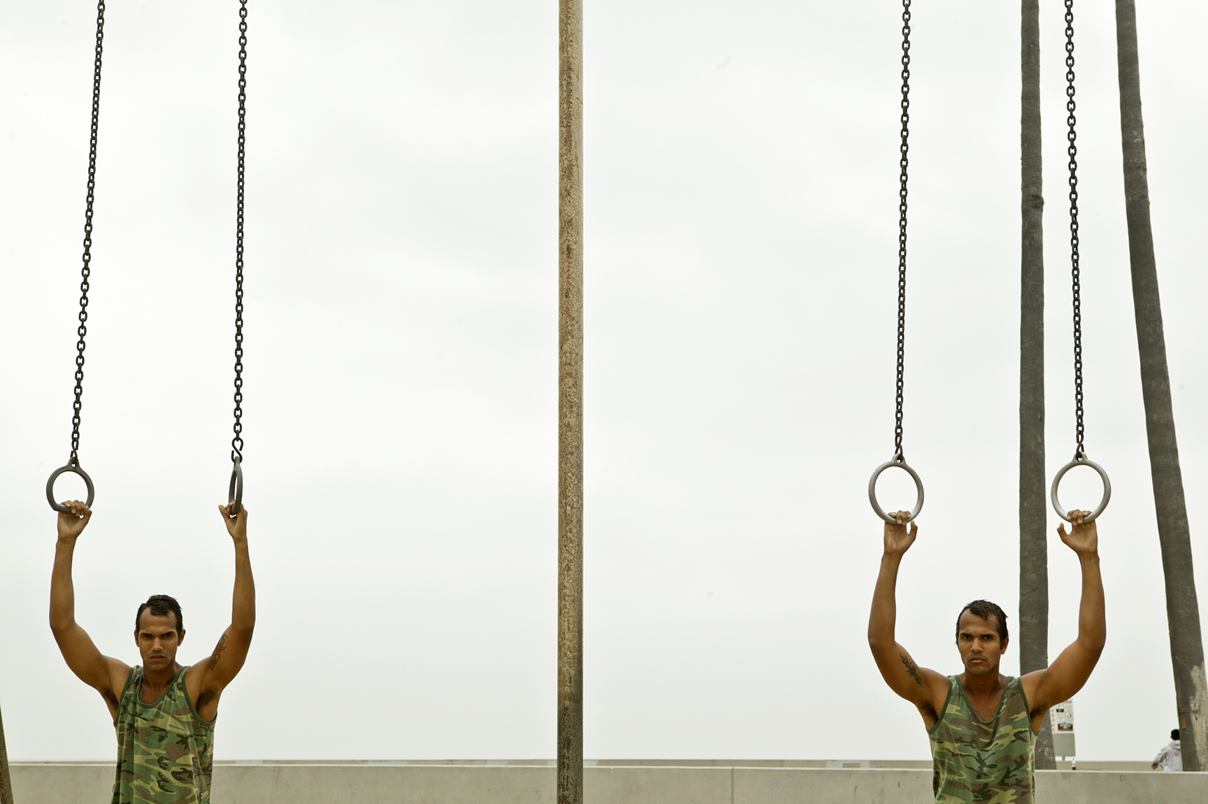 Mateus and Romero, identical twins from Brazil, work out at Venice Beach. The two came to California to pursue acting careers.