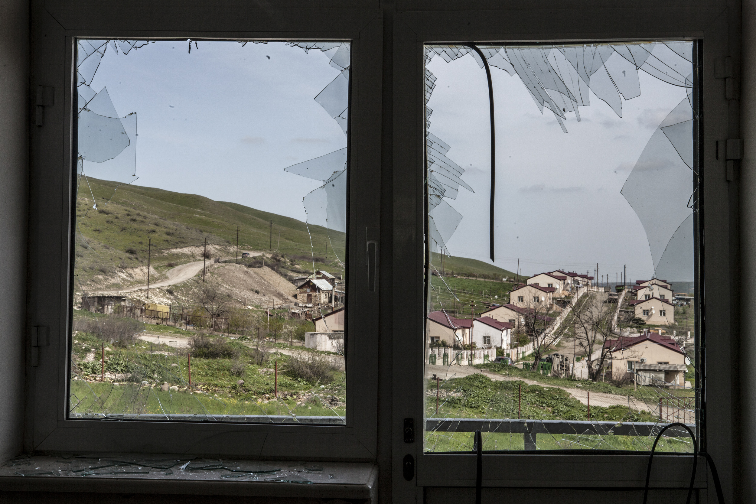  April 5- shattered windows of a school in the village of Mataghis where heavy shelling had taken place.  