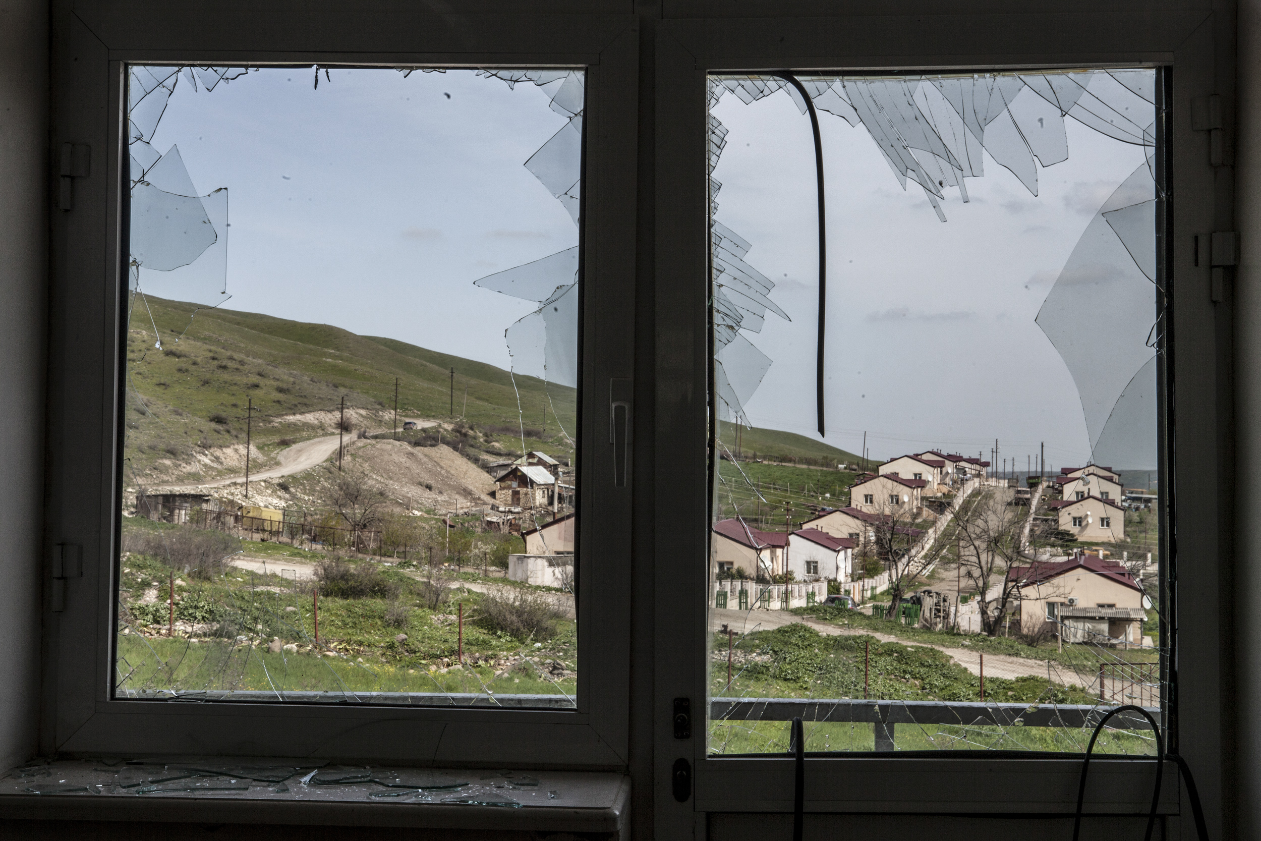 April 5- shattered windows of a school in the village of Mataghis where heavy shelling had taken place.