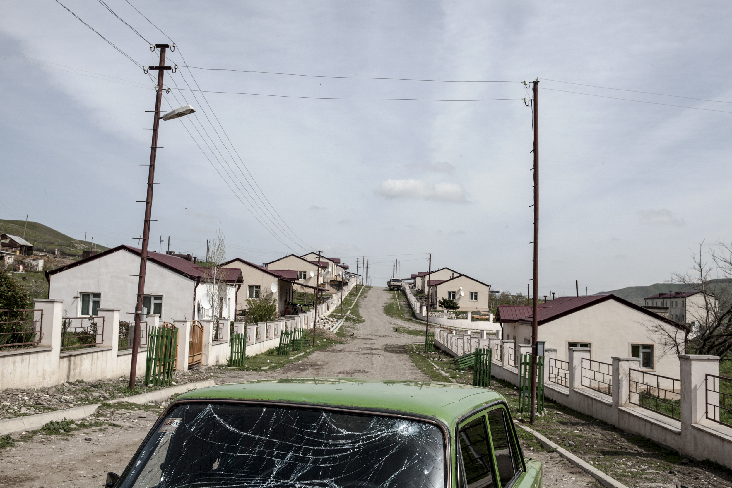 A road in the village of Mataghis with abandoned cars and houses shelled by Azerbaijani Army - April 5.