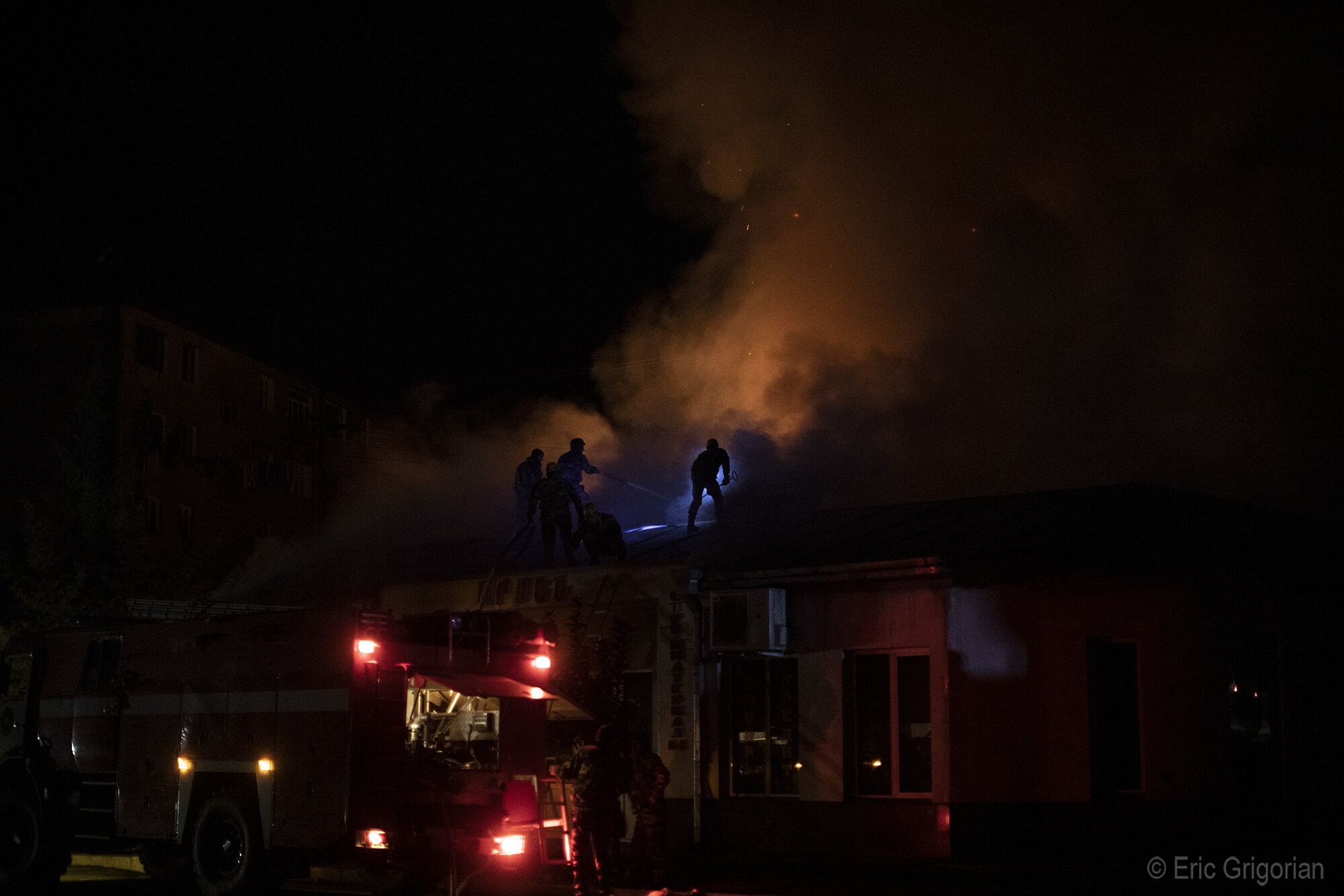  A fire breaks out after a store is hit late in the evening of Oct. 3. 