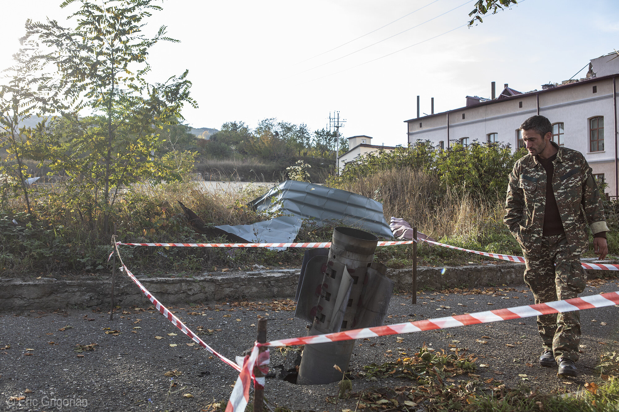  An unexploded rocket next to The Cultural and Youth Center in Shushi after an airaid on Oct. 7 by Azerbaijani forces. 