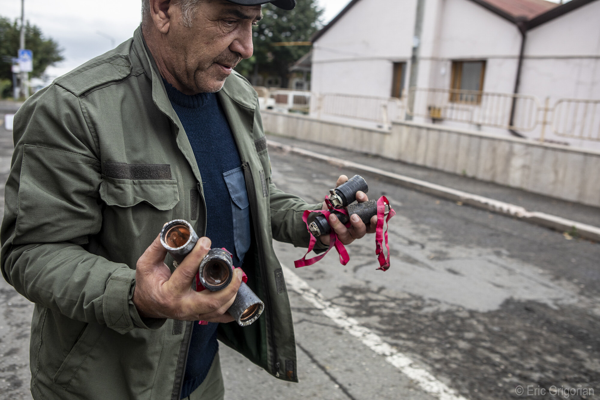  Unexploded cluster bomblets are collected immediately after a residential neighborhood of Stepanakert, the capital of Karabakh, was  bombed by Azerbaijan on Oct. 4.     