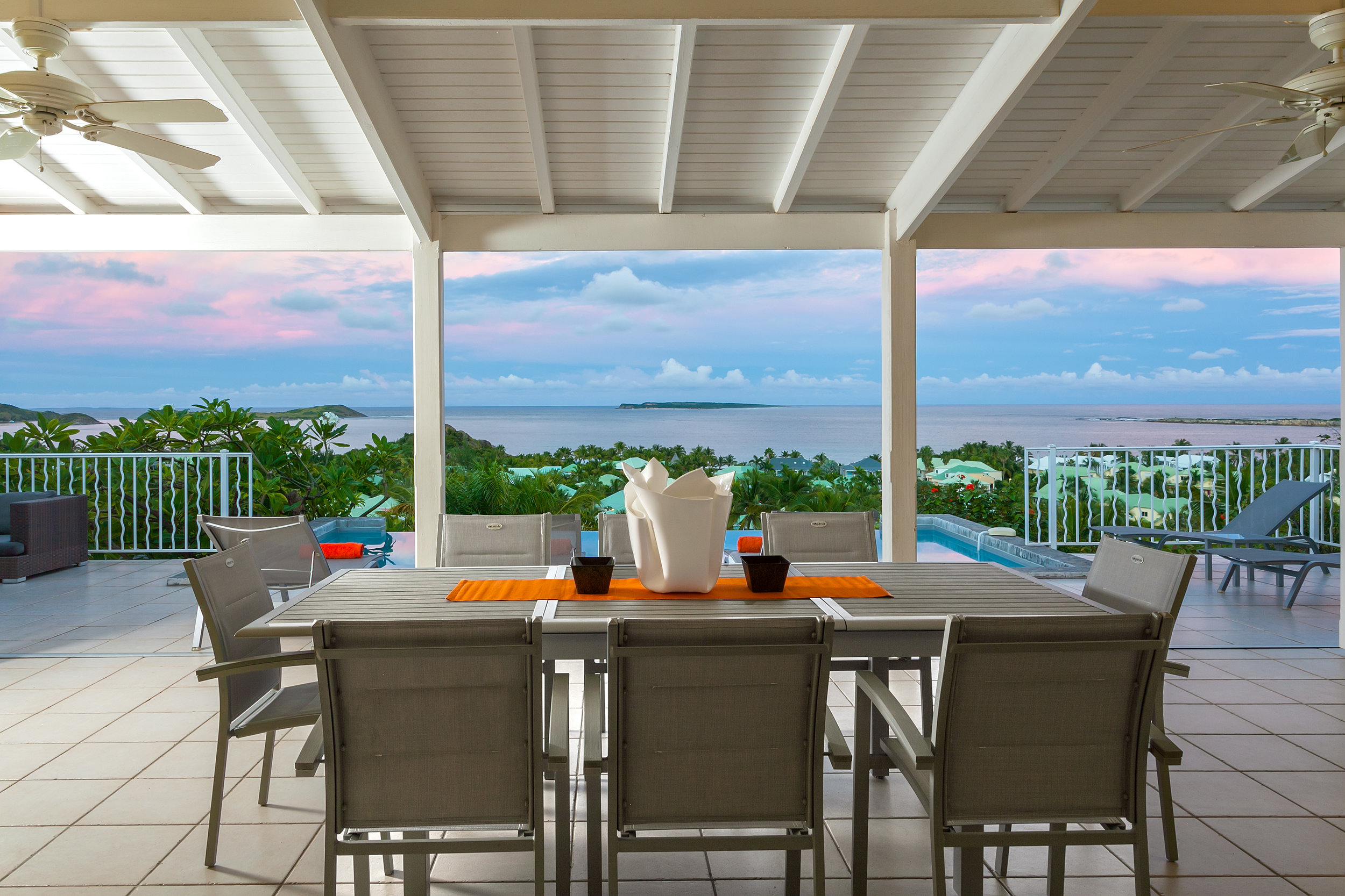 Covered outdoor dining area with sea view.jpg