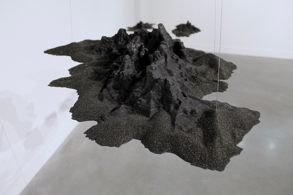 Shadow Sites (detail), laser cut layered tar paper, coal slag, charcoal, wire, metal - dimensions variable, 2018