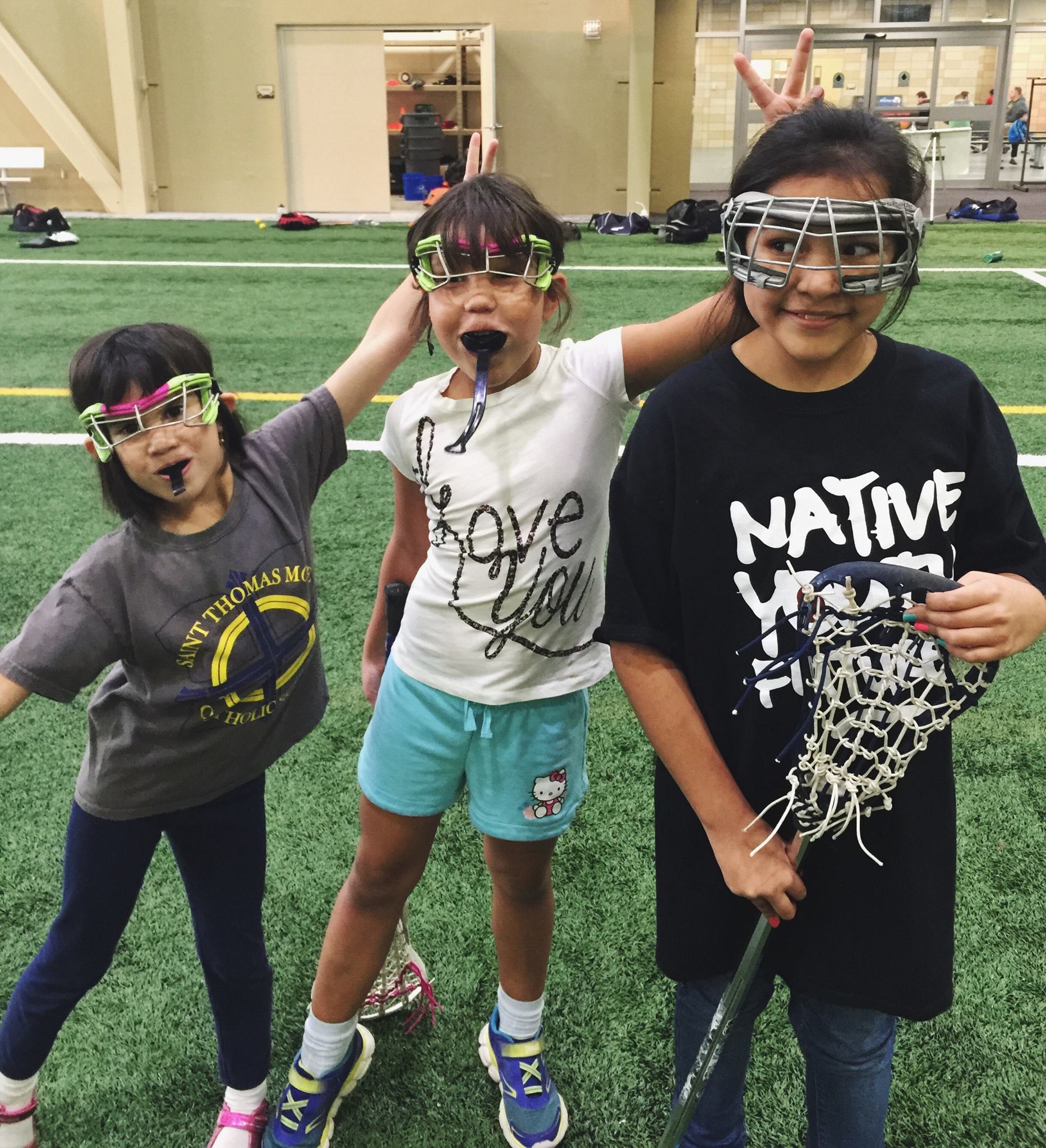 Delia Dockry Paredes, Stella Hunter and Wicahpi Thompson play both the modern game and the traditional game. Photo: Sasha Lee Brown. 