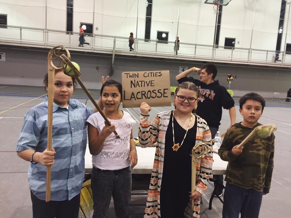  Mato Thompson, Wicahpi Thompson, Dalaney Villebrun and Ocean Walker representing Twin Cities Native Lacrosse at the Minneapolis American Indian College Fair. Photo: Sasha Lee Brown.&nbsp; 