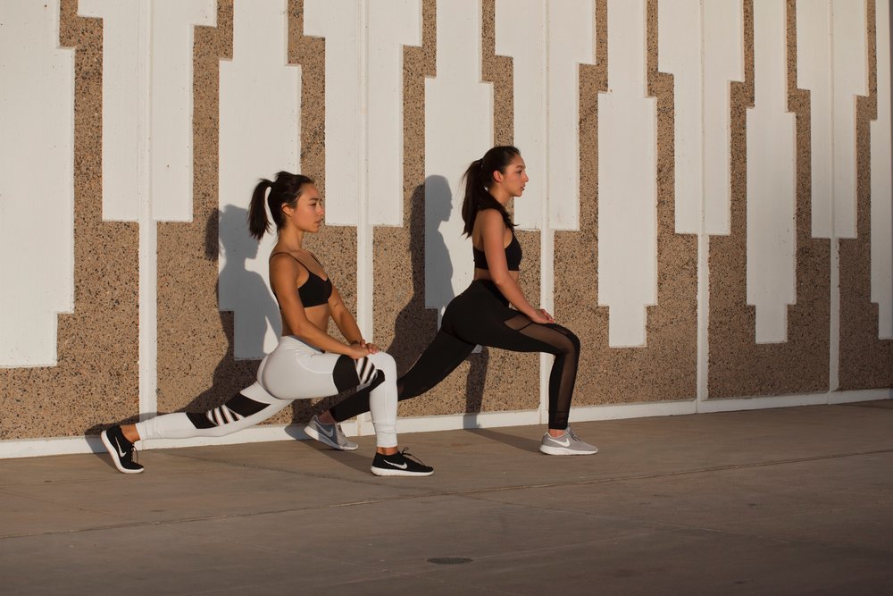  When I took these photos with my sis Corina, I felt like crap but didn't know why. Days later, I would find out the exciting news that I was pregnant! | Photo by Thosh Collins. Tights by Asteria Activewear.&nbsp; 